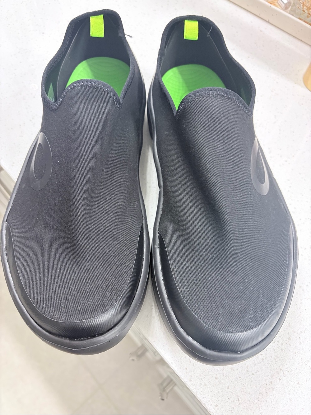 OOFOS Black Slip-On Recovery Loafers with Subtle Logo
